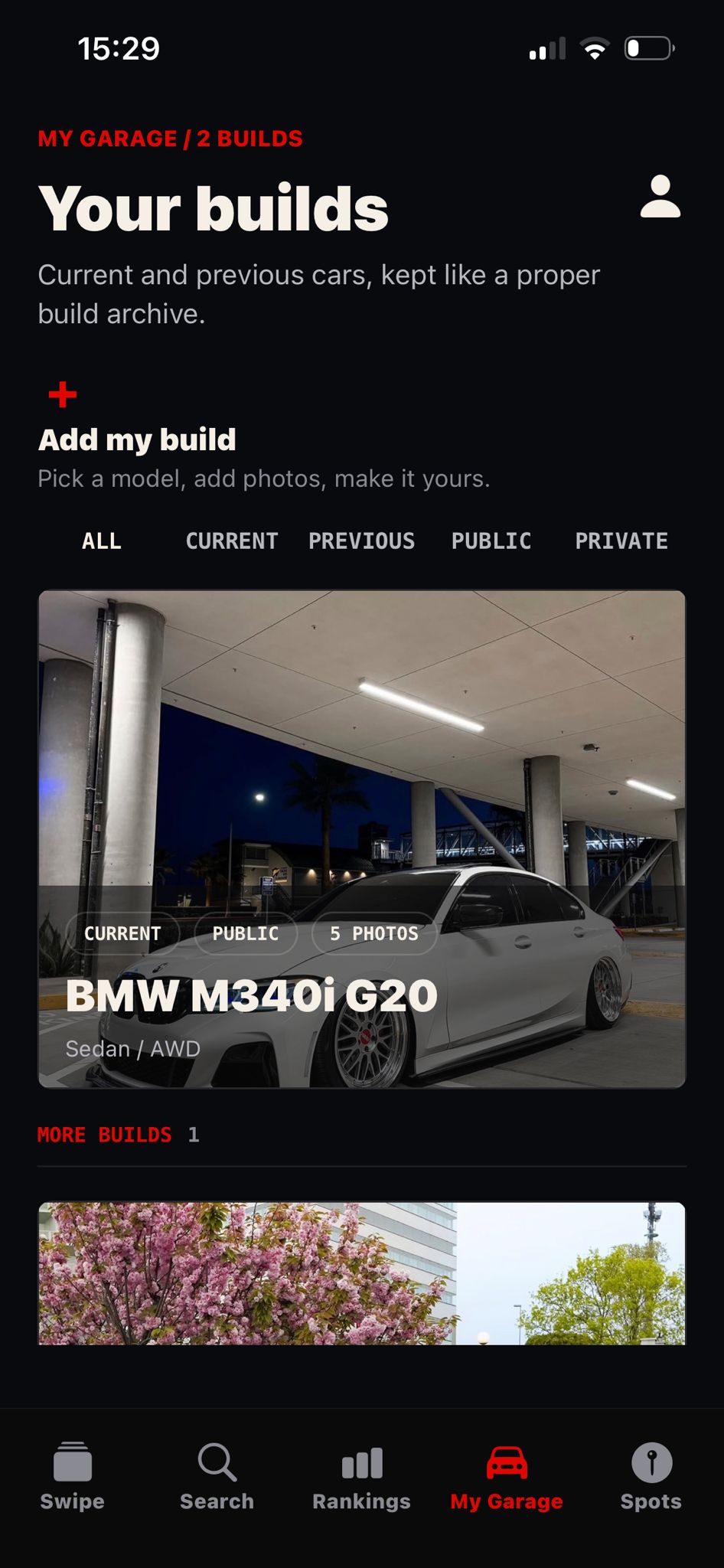 RevClub garage screen showing the add my build entry and a BMW M340i build card.
